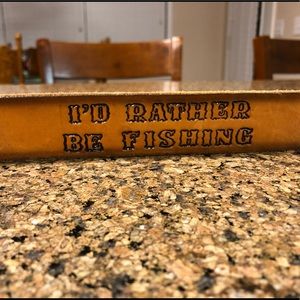 A belt for a fisherman named John. Size 44